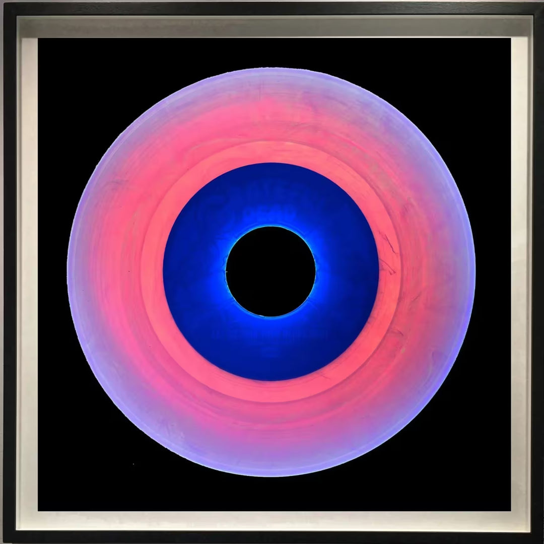 A framed limited edition photograph by Richard Heeps using vibrant colours, the title is Vinyl Collection &
