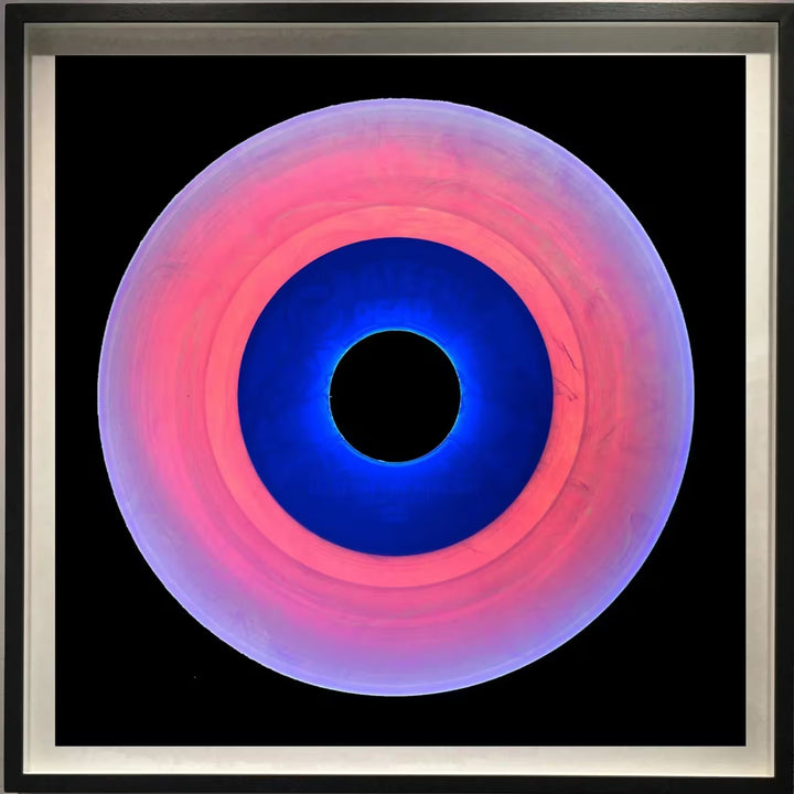 A framed limited edition photograph by Richard Heeps using vibrant colours, the title is Vinyl Collection &