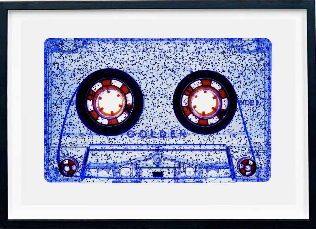 A framed limited edition photograph by Richard Heeps using vibrant colours, the title is Tape Collection All That Glitters is Not Golden