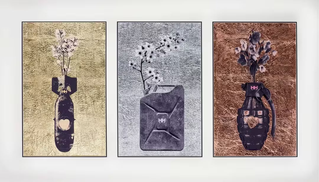 A Maxim limited edition of a bomb, carton, and grenade with flowers growing out of them, the title is Armed With Love