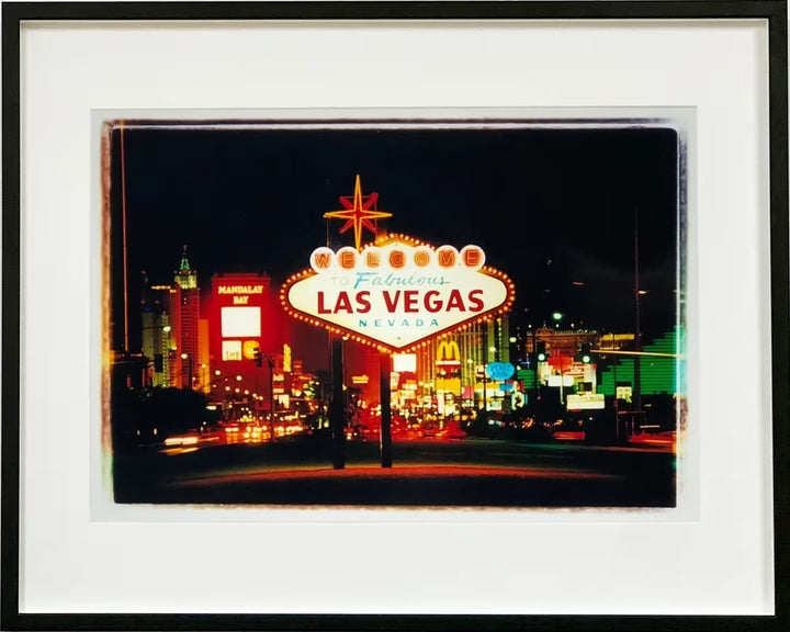 A framed limited edition photograph by Richard Heeps using vibrant colours, the title is Arriving Las Vegas 2002