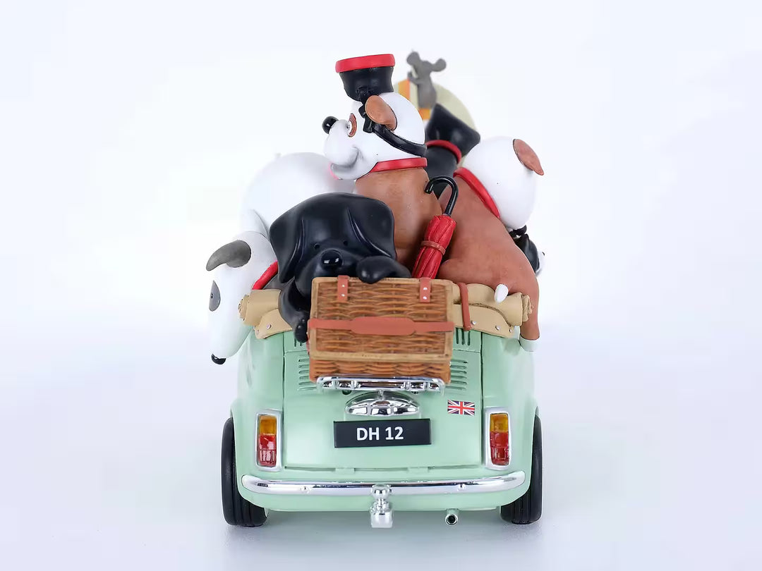 A Doug Hyde porcelain sculpture of a person in a green car with dogs and cats and beach items in the car, the title is Beach Buddies