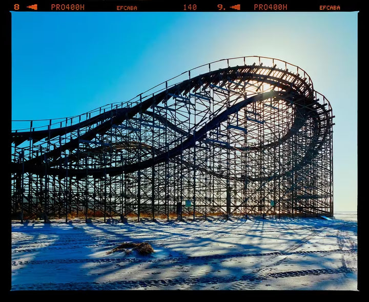 A limited edition photograph by Richard Heeps using vibrant colours, the title is Beached Roller Coaster, Wildwood, New Jersey, 2013