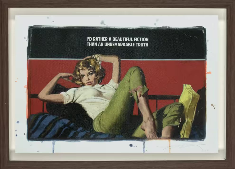 A limited edition framed piece by The Connor Brothers of a lady laying across a bed, the title is Beautiful Fiction 