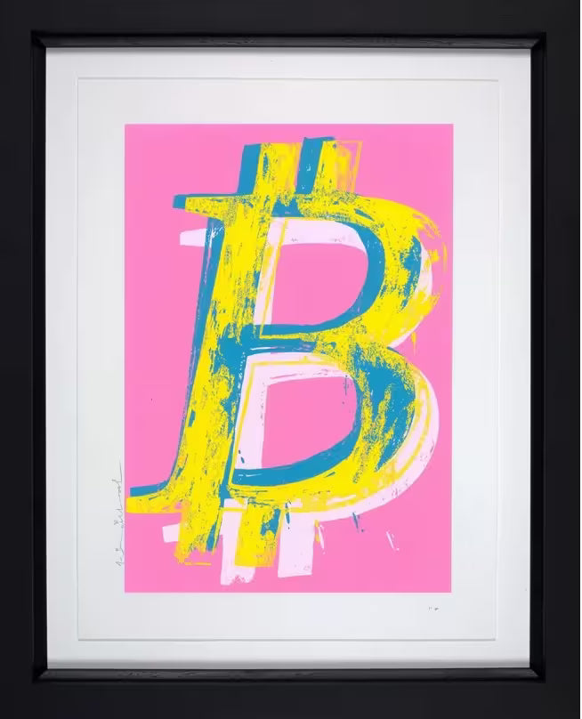 A Mr Brainwash framed limited edition of a bitcoin symbol in yellow, blue, and white against a pink background, the title is Bitcoin (Pink)