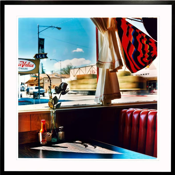 A framed limited edition photograph by Richard Heeps using vibrant colours, the title is Bonzanza Cafe Lone Pine California