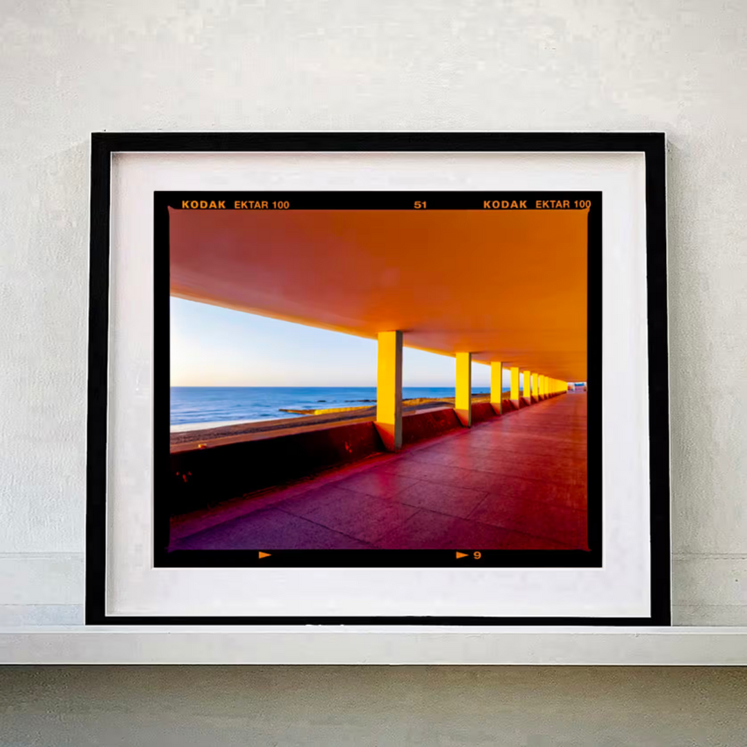 A Richard Heeps black framed limited edition photographic print, the title is Bottle Alley I, St Leonards-on-Sea, 2025