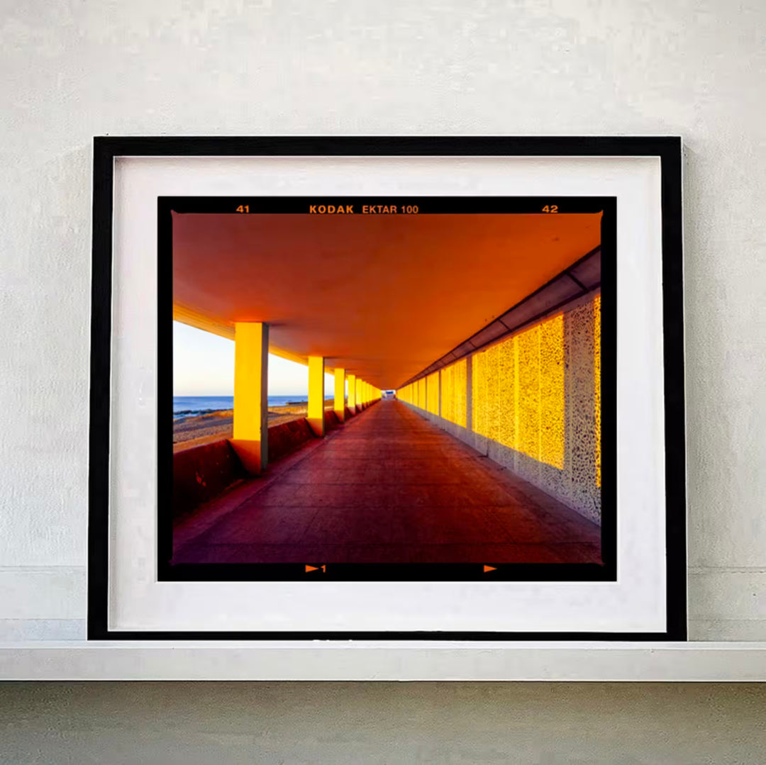 A Richard Heeps black framed limited edition photographic print, the title is Bottle Alley II, St Leonards-on-Sea, 2025