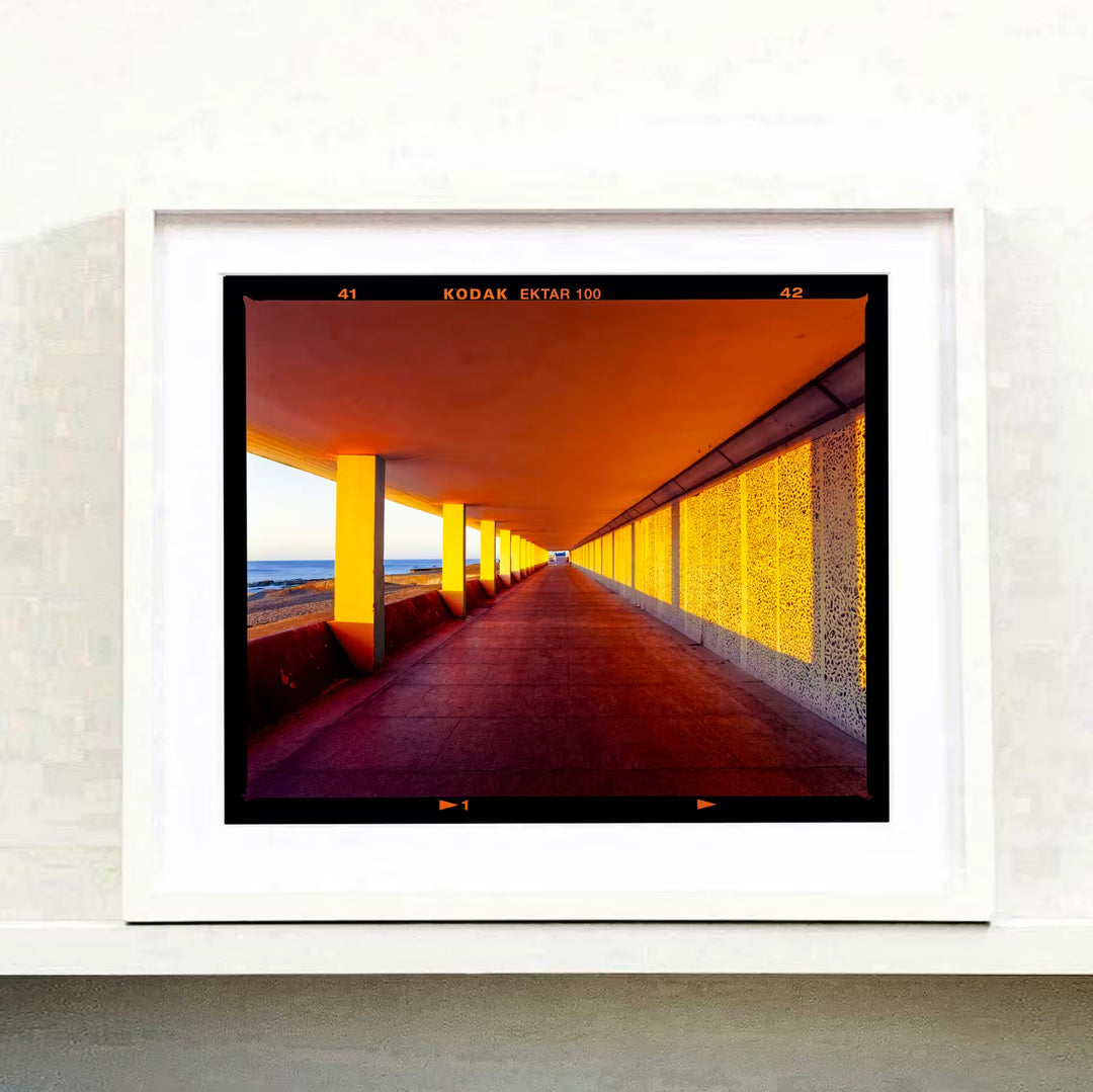 A Richard Heeps white framed limited edition photographic print, the title is Bottle Alley II, St Leonards-on-Sea, 2025