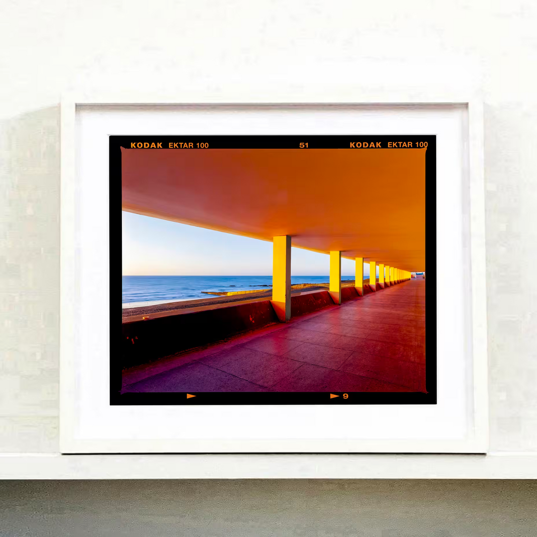 A Richard Heeps white framed limited edition photographic print, the title is Bottle Alley I, St Leonards-on-Sea, 2025