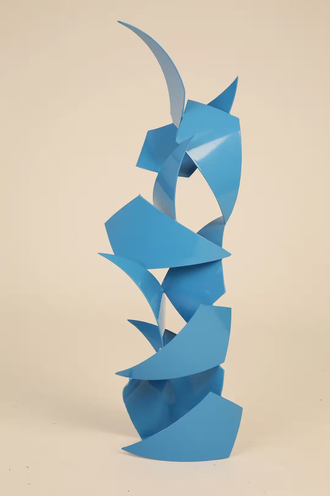 A Gareth Griffiths original sculpture of geometric shapes arranged into a tower, the title is Brunswick