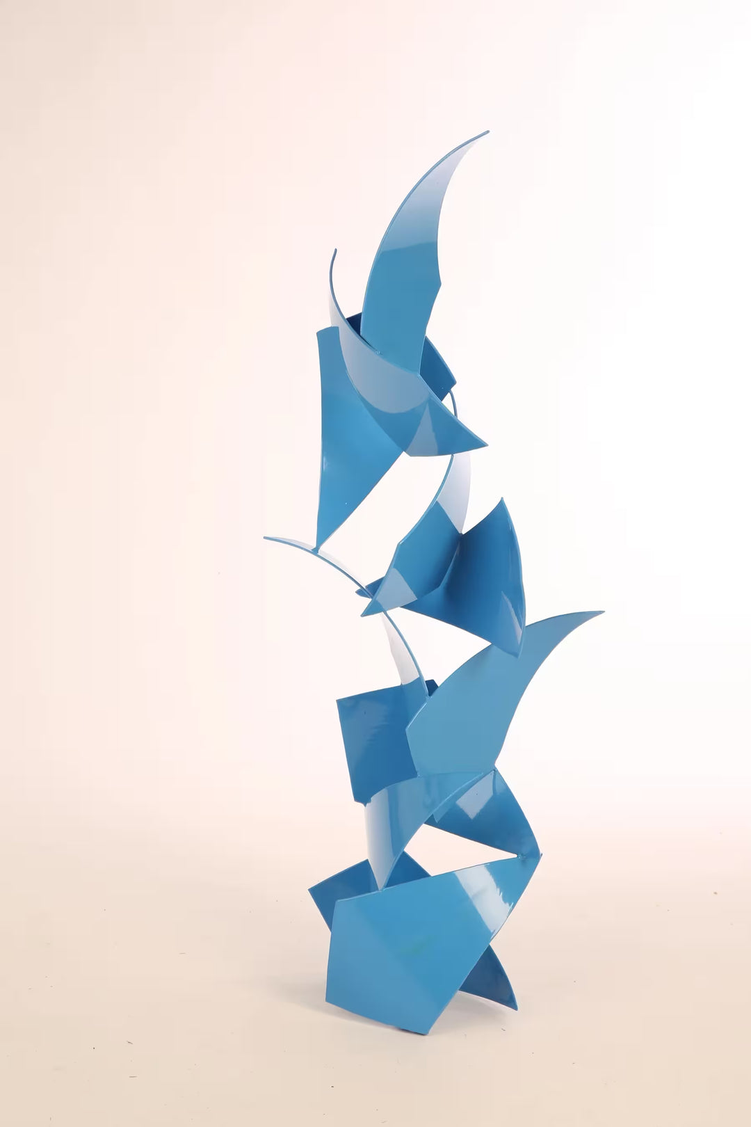 A Gareth Griffiths original sculpture of geometric shapes arranged into a tower, the title is Brunswick