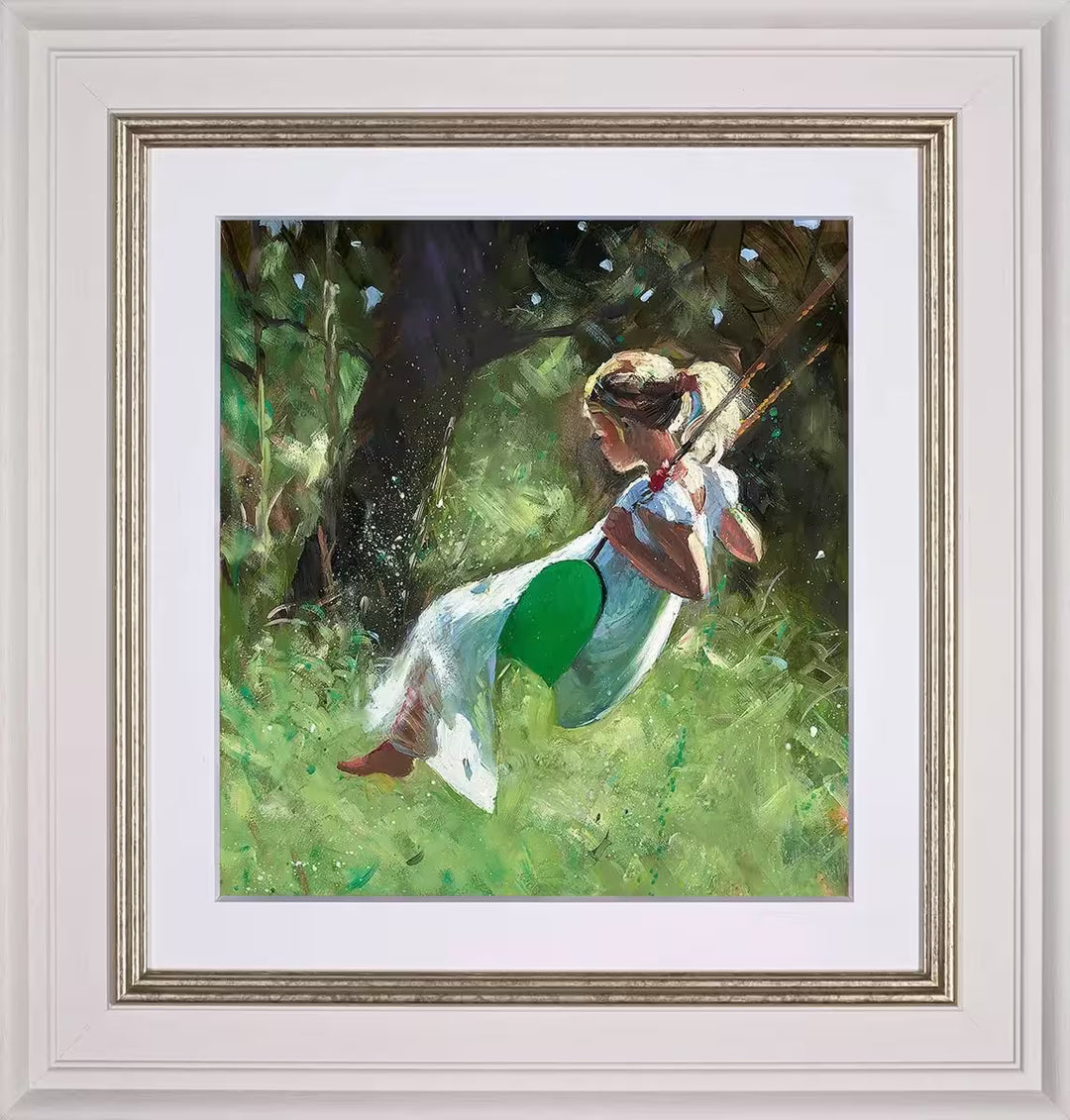 A Sherree Valentine Daines framed limited edition of a girl in a white dress on a swing, the title is Carefree Summer&