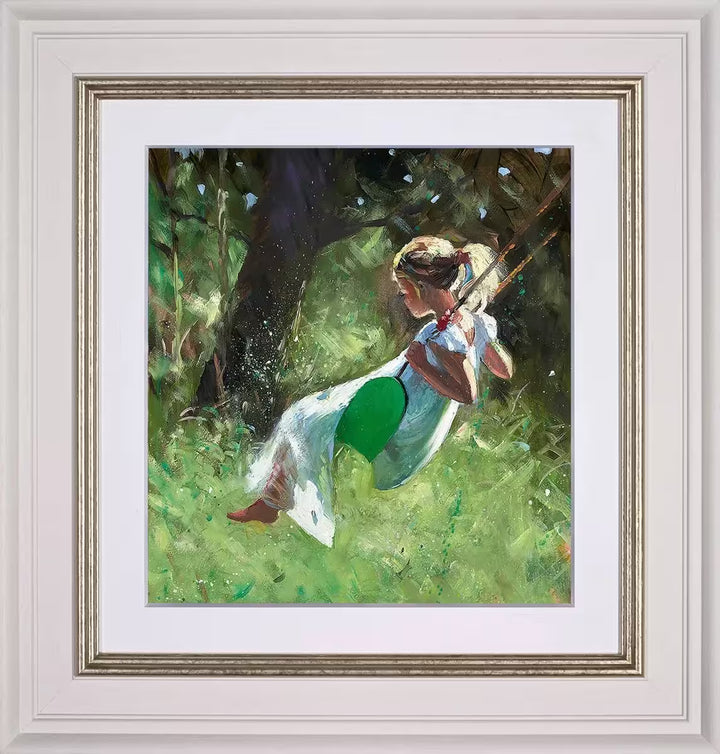 A Sherree Valentine Daines framed limited edition of a girl in a white dress on a swing, the title is Carefree Summer&