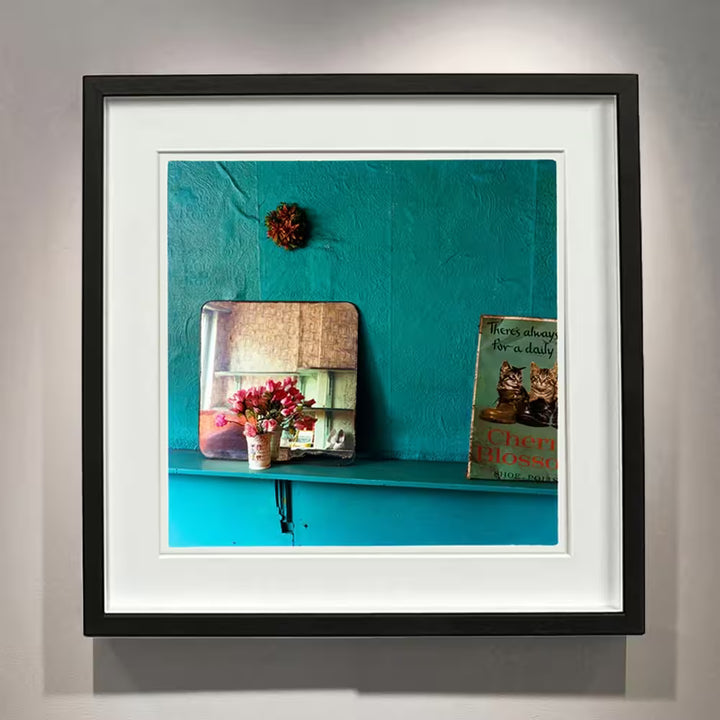 A framed limited edition photograph by Richard Heeps using vibrant colours, the title is Cats, Salford, 1987