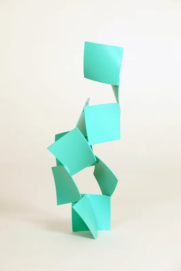 A Gareth Griffiths original geometric sculpture of thin squares arranged into a tower, the title is Chips