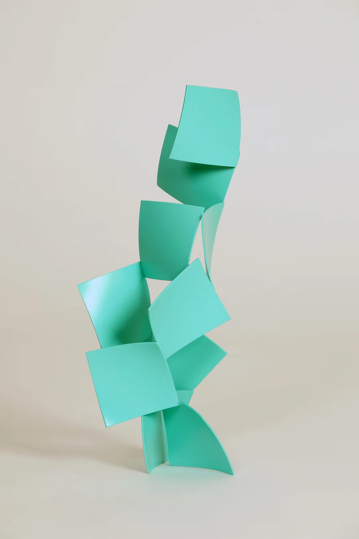 A Gareth Griffiths original geometric sculpture of thin squares arranged into a tower, the title is Chips