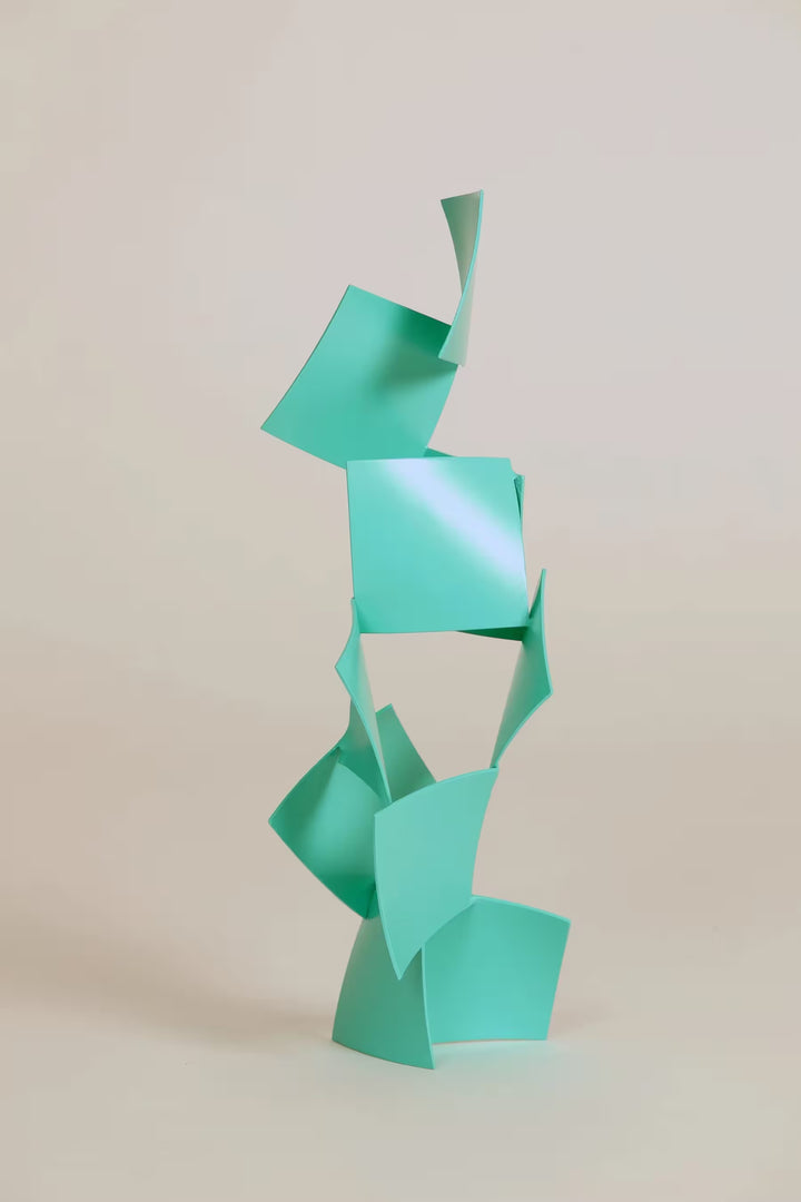 A Gareth Griffiths original geometric sculpture of thin squares arranged into a tower, the title is Chips
