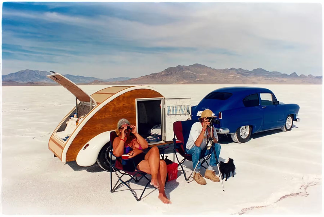 A limited edition photograph by Richard Heeps using vibrant colours, the title is Christine '52 Henry J & Teardrop, Bonneville, Utah, 2003