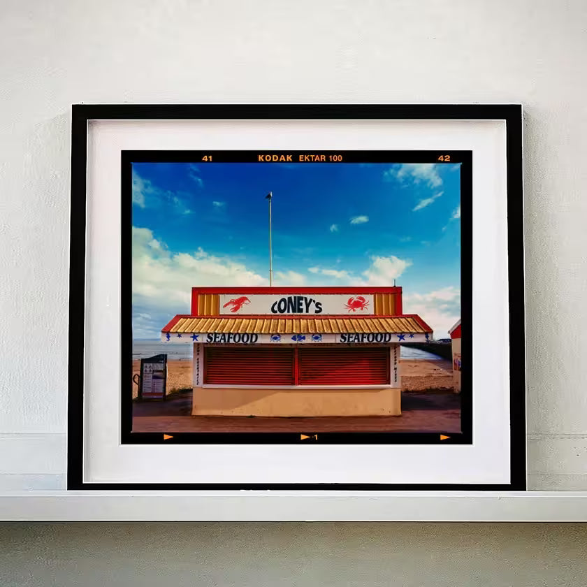 A framed limited edition photograph by Richard Heeps using vibrant colours, the title is Coney&