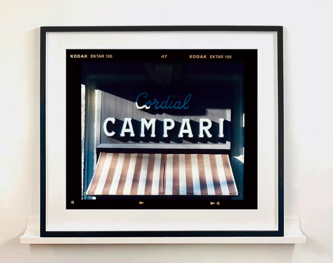 A framed limited edition photograph by Richard Heeps using vibrant colours, the title is Cordial Campari