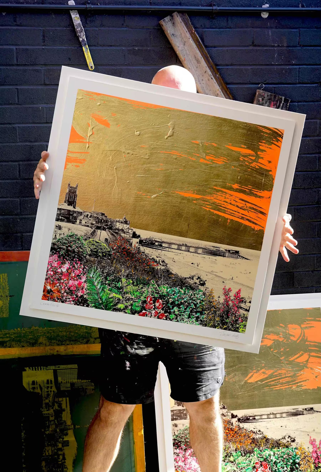 Jayson Lilley holding Cromer Pier