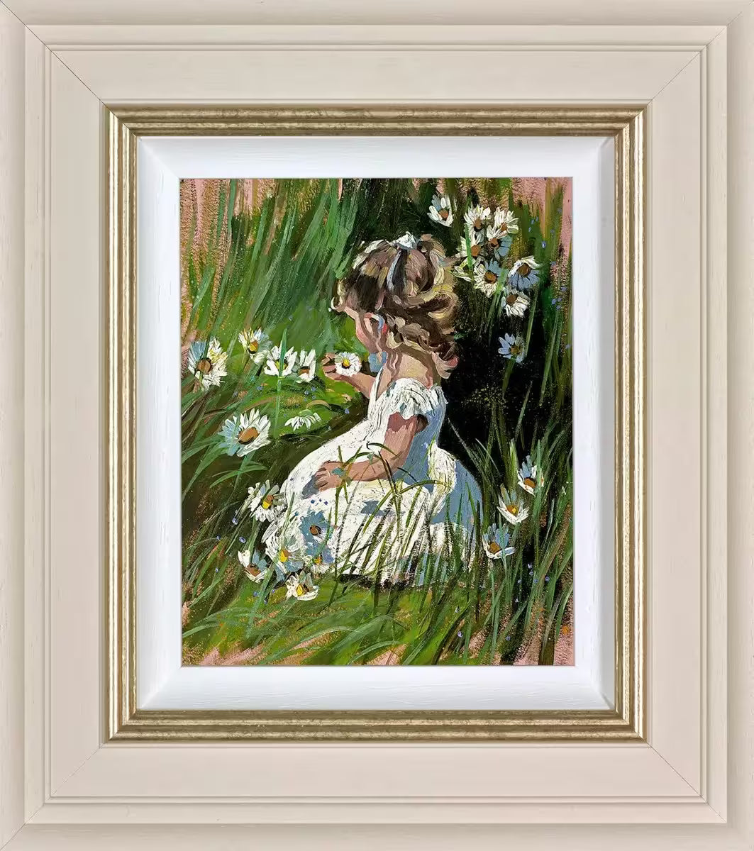 A Sherree Valentine Daines framed limited edition of a girl in a white dress kneeling and picking daisies, the title is Daisy Delight