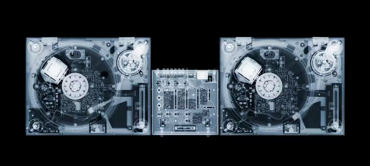 A limited edition Chromaluxe print by Nick Veasey of an X-Rayed DJ board stack, the title is Decks
