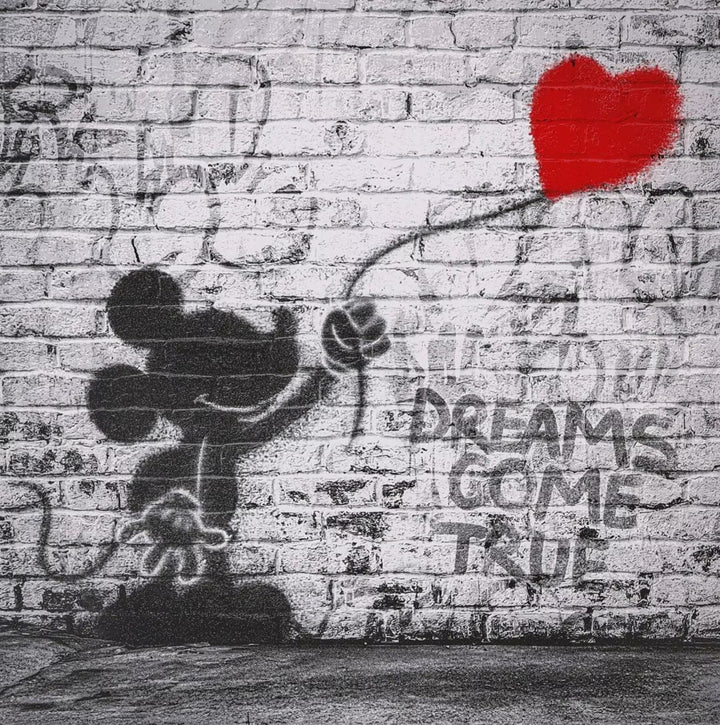 A Mr Brainwash limited edition of a grey wall with Mickey Mouse holding onto a red balloon spray painted onto it, the title is Dreams Come True (Deluxe)