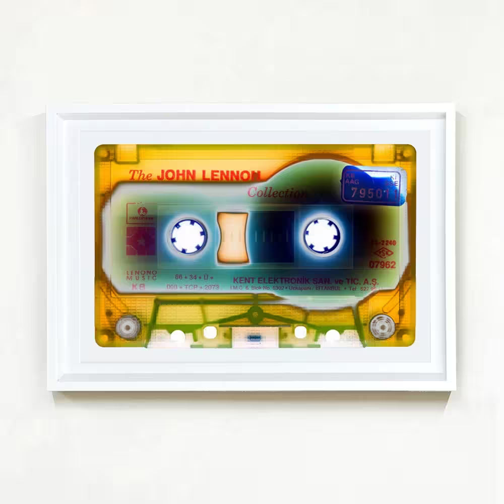 A white framed limited edition photograph by Richard Heeps using vibrant colours, the title is Tape Collection Elektronik 2023
