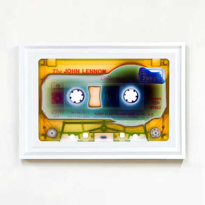 A white framed limited edition photograph by Richard Heeps using vibrant colours, the title is Tape Collection Elektronik 2023