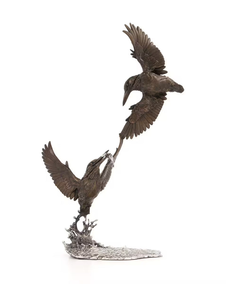 Bronze sculpture of two birds in mid-flight on a white background, First Prize by Dean Kendrick