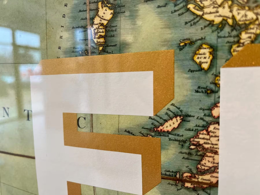 A limited edition by The Real Hackney Dave of a map of the United Kingdom with screenprint over the top, the title is Fish &amp; Chips