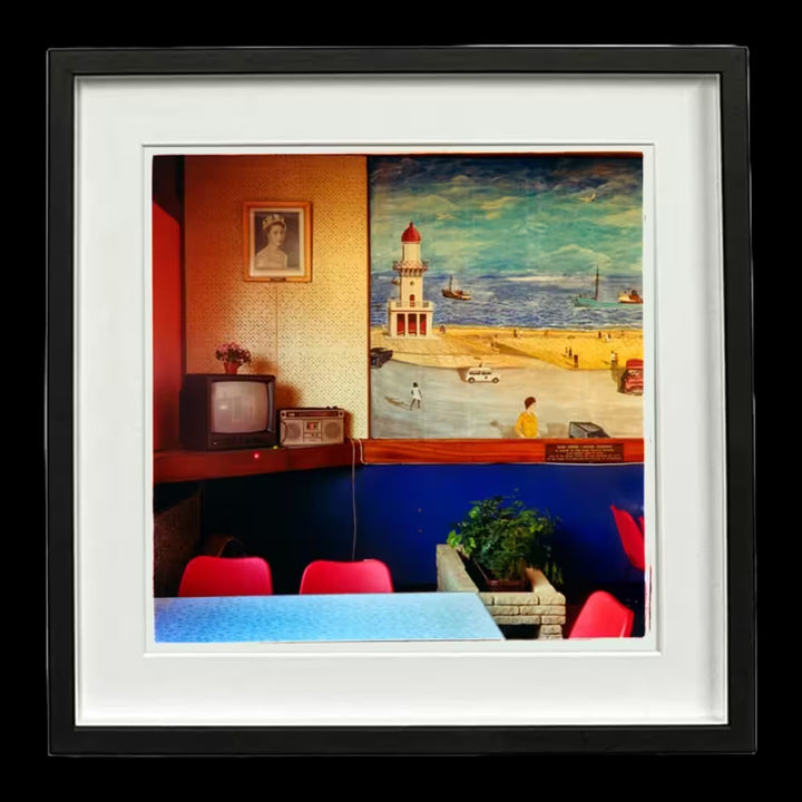 A framed limited edition photograph by Richard Heeps using vibrant colours, the title is Fishermans Mission II