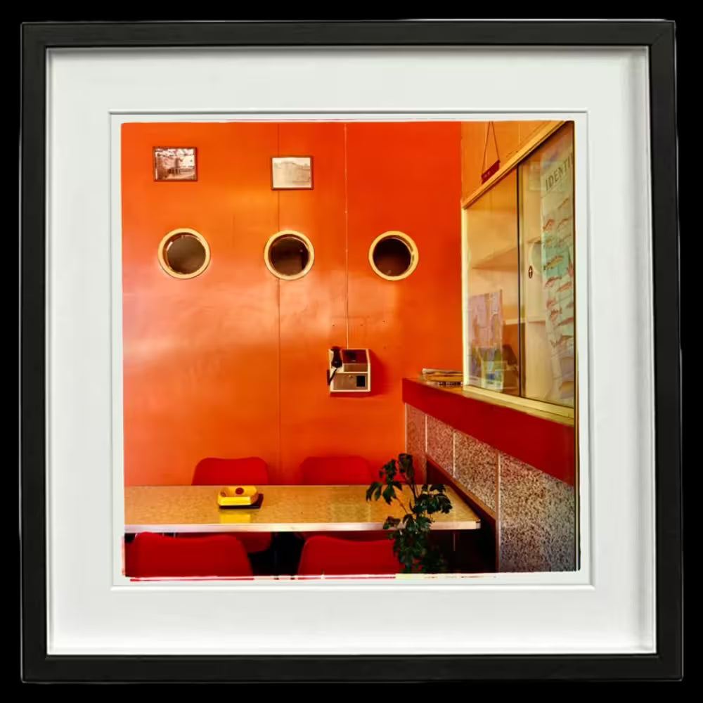 A framed limited edition photograph by Richard Heeps using vibrant colours, the title is Fishermans Mission I