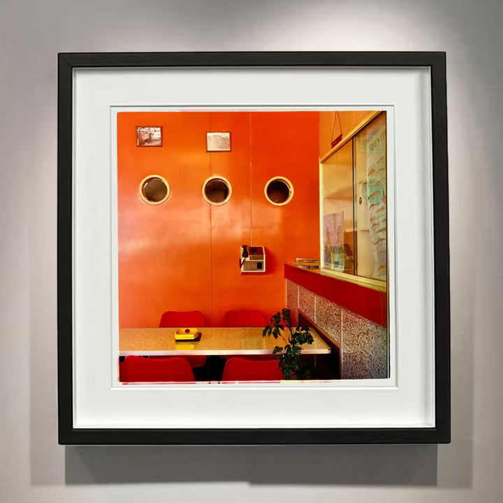 A framed limited edition photograph by Richard Heeps using vibrant colours, the title is Fishermans Mission I