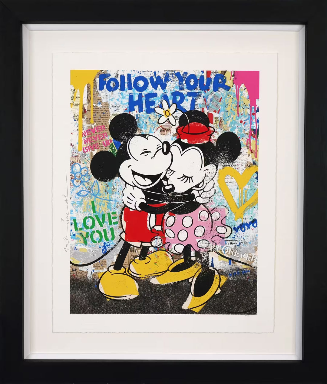 A Mr Brainwash framed limited edition of Mickey and Minnie Mouse hugging and smiling against a wall covered in newspaper clippings and spray paint, the title is Forever Starts Here