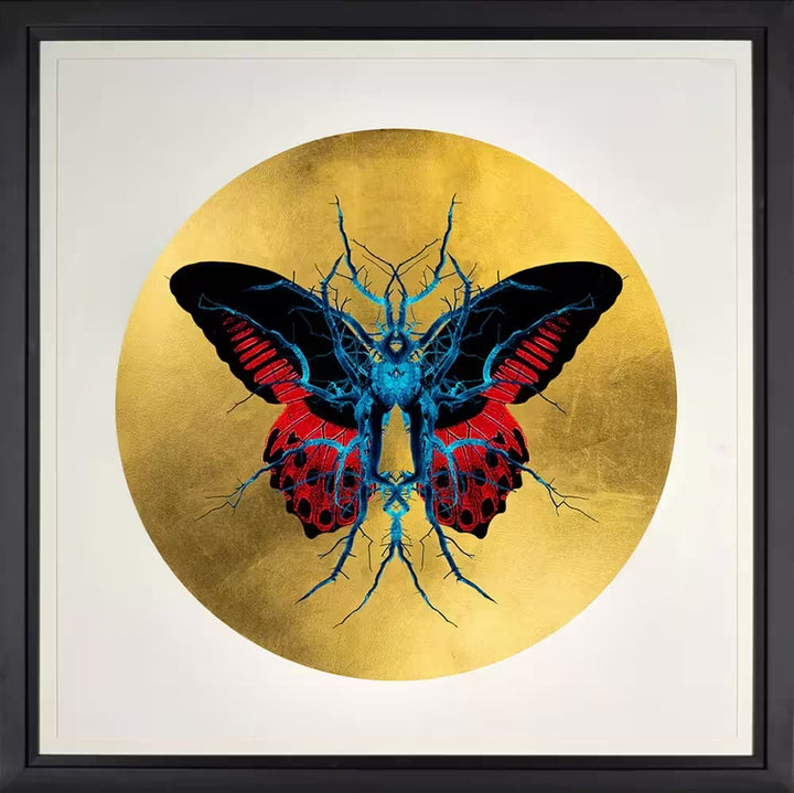 A Maxim limited edition of a butterfly with it&