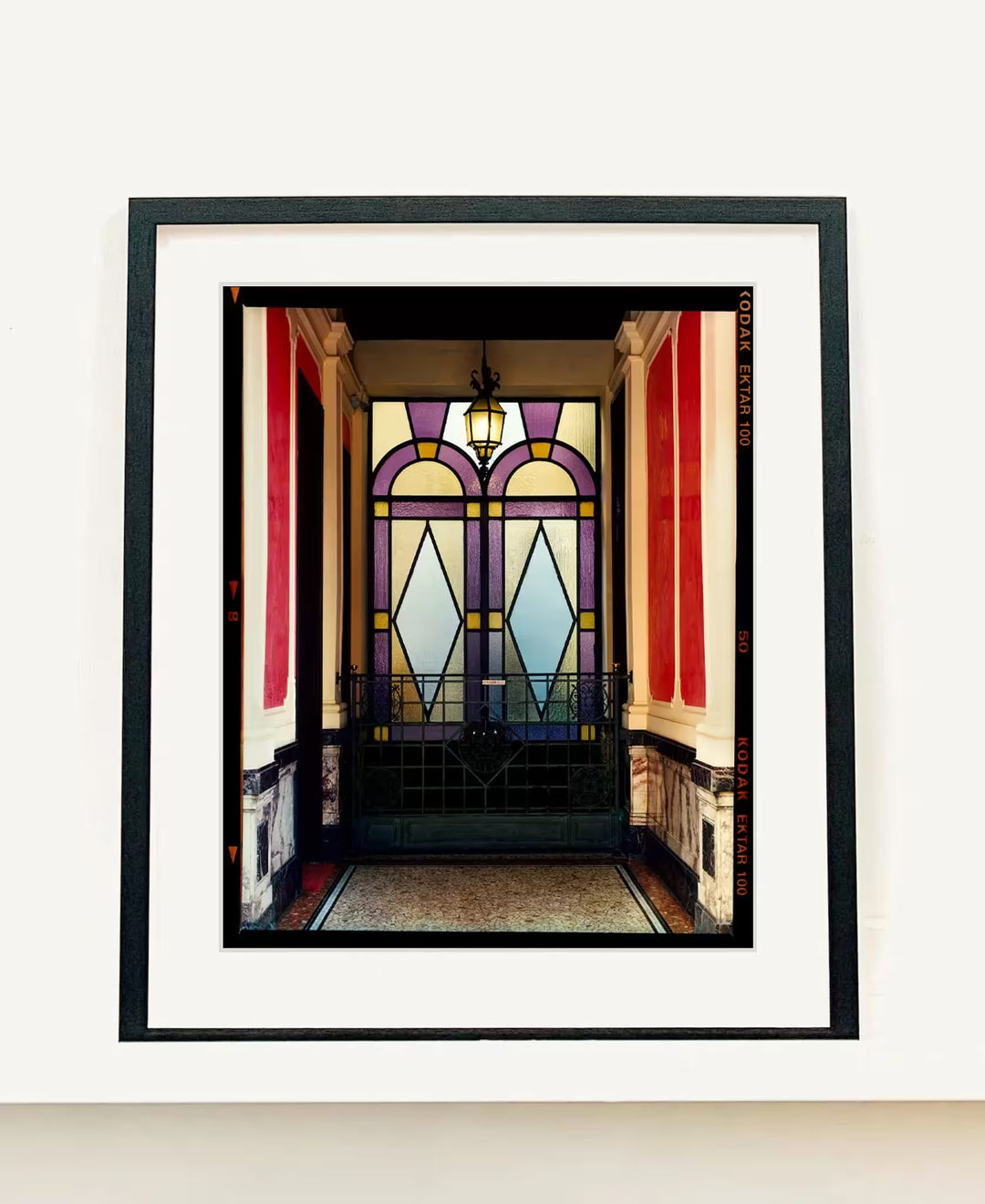A framed limited edition photograph by Richard Heeps using vibrant colours, the title is Foyer VII, Milan, 2020