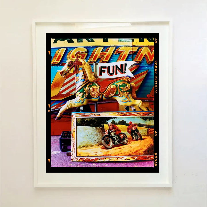 A white framed limited edition photograph by Richard Heeps using vibrant colours, the title is FUN! Maidenhead, 2022