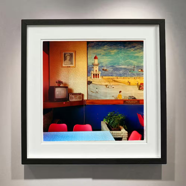 A framed limited edition photograph by Richard Heeps using vibrant colours, the title is Fishermans Mission II