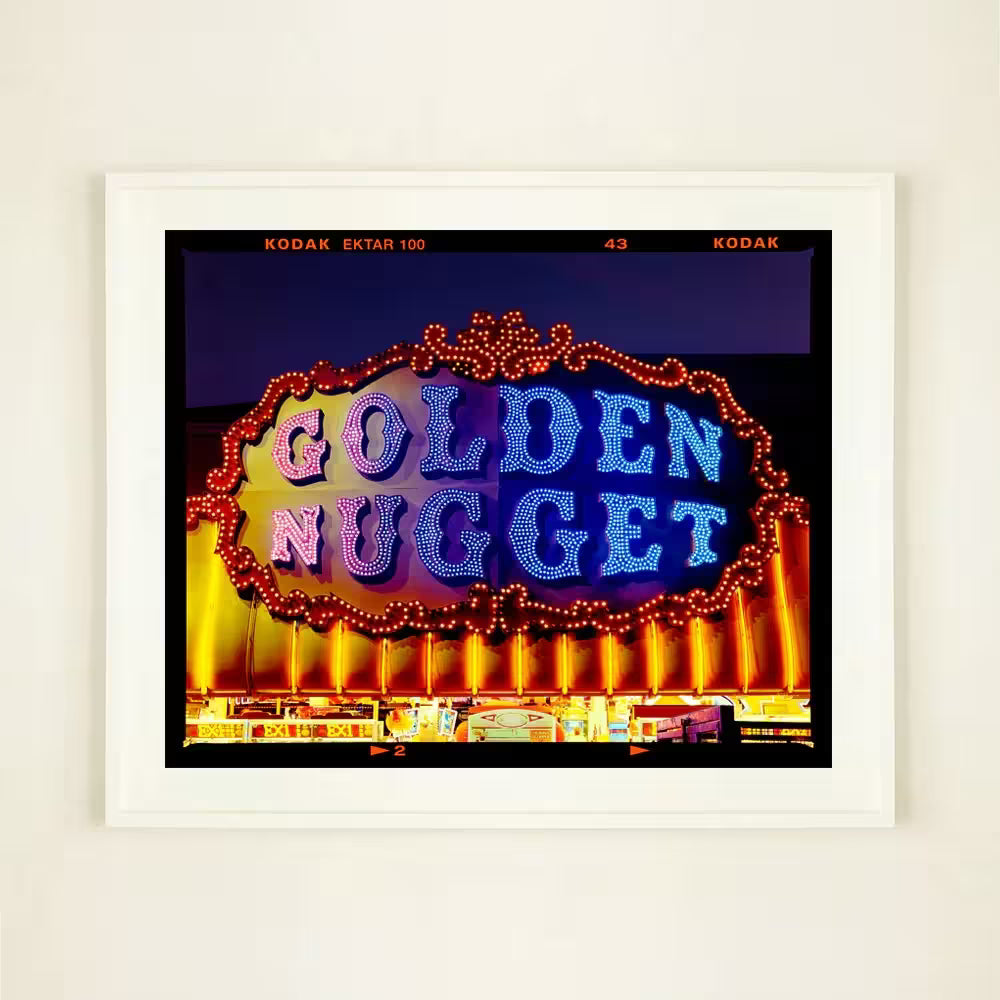 A white framed limited edition photograph by Richard Heeps using vibrant colours, the title is Golden Nugget, Norfolk, 2022