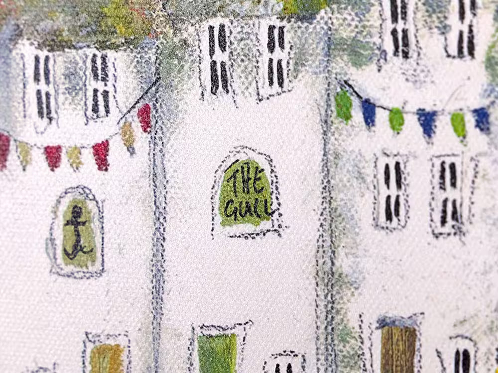 A Rebecca Lardner limited edition of a few houses on a stone cliff behind a beach with boats pulling in and people, the title is Harbour Hideaway II