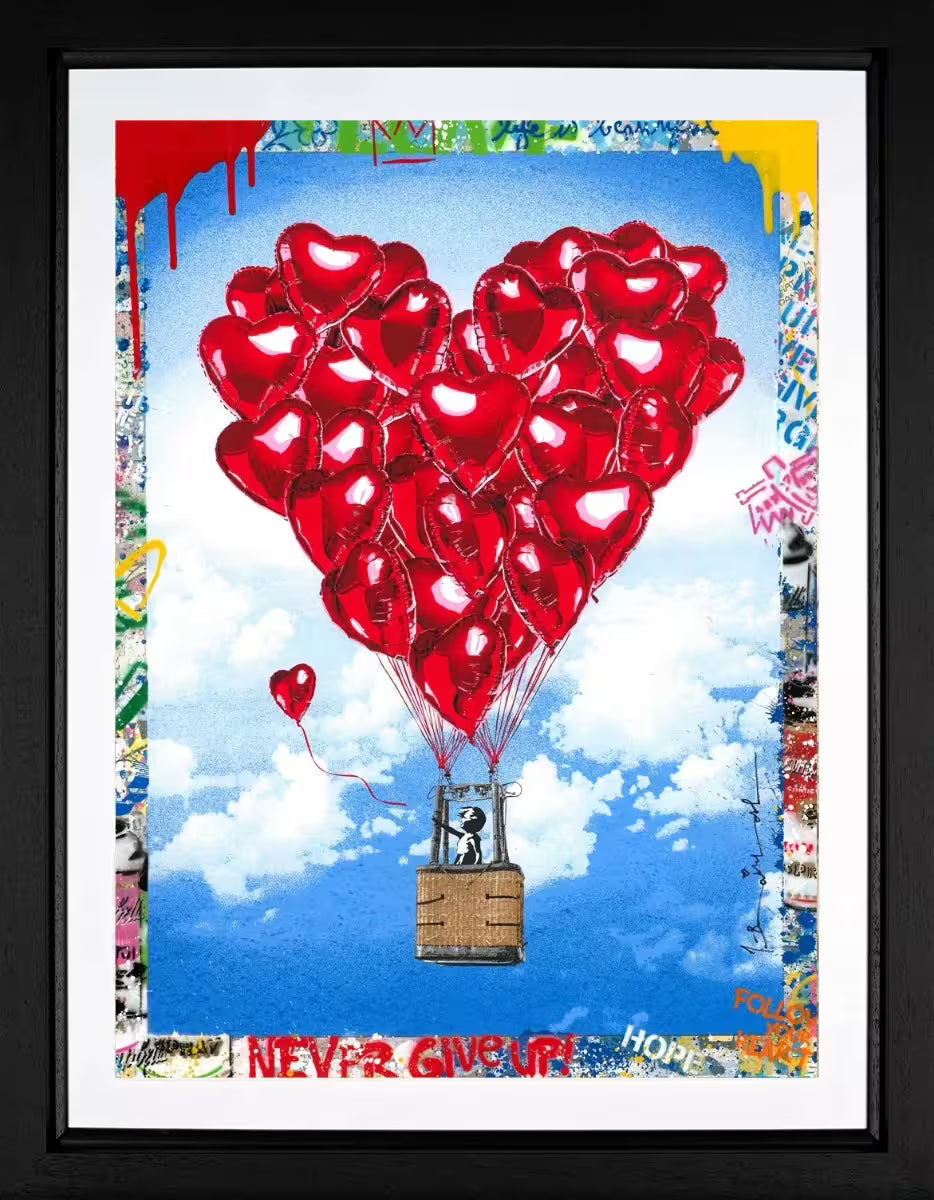 A Mr Brainwash framed original of a hot air balloon made up of individual red heart balloons and a little girl in the basket letting go of a smaller heart balloon, the title is High on Love