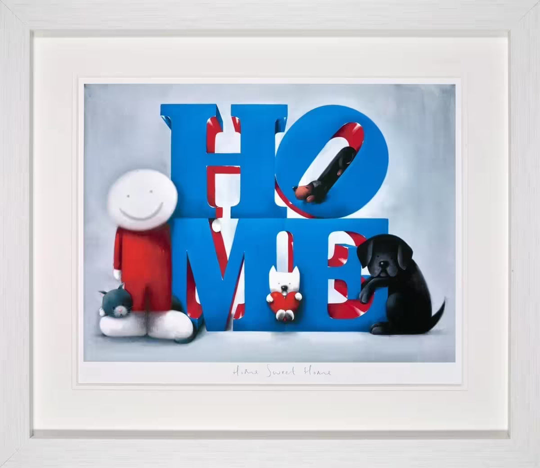 A Doug Hyde limited edition framed of a the word 'Home' in blue, there are three dogs scattered through the letters, to the left is a person in red and a cat resting on their foot, the title is Home Sweet Home