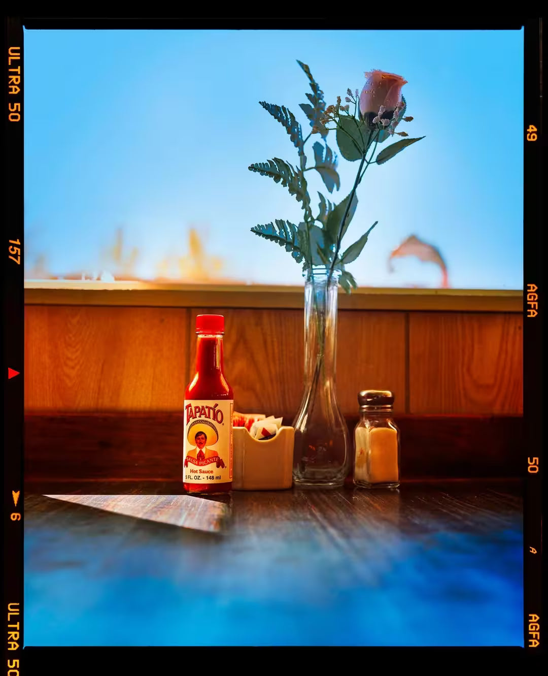 A limited edition photograph by Richard Heeps using vibrant colours, the title isHot sauce, Lone Pine, California, 2001