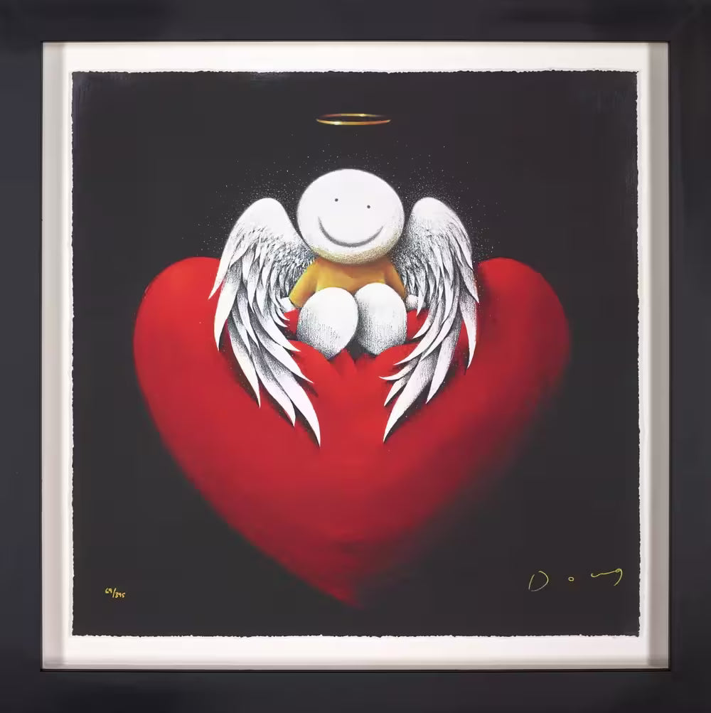 A Doug Hyde limited edition print framed, an angel in gold with wings and a halo sat on top of a red heart, the title is Heavenly Love