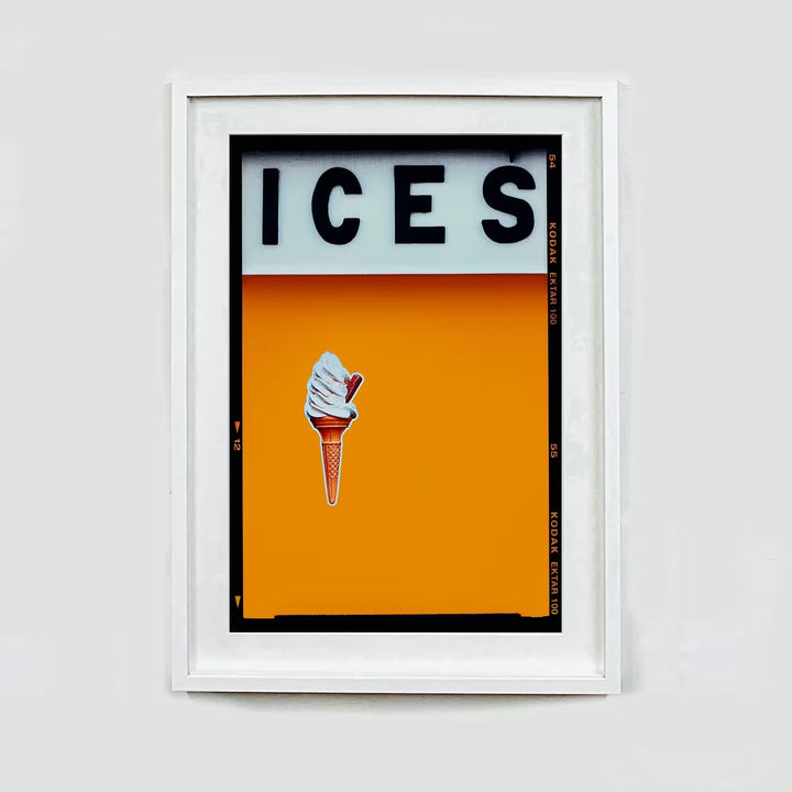 A white framed limited edition photograph by Richard Heeps using vibrant colours, the title is Ices (Satsuma Orange)