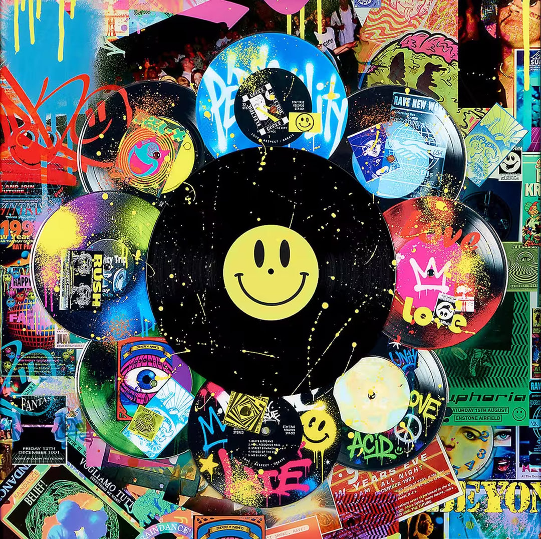 A limited edition mixed media piece by Dan Pearce of lots of differrent vinyl records with spraypaint and designs all over them, the title is In The Mix