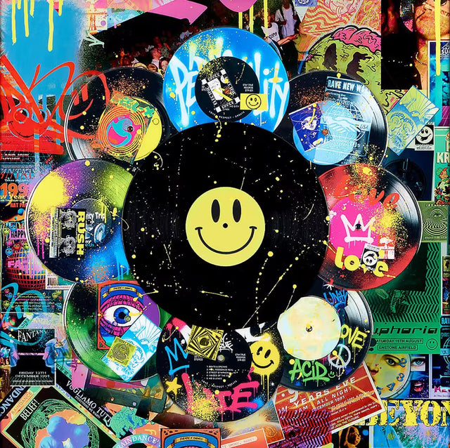 A limited edition mixed media piece by Dan Pearce of lots of differrent vinyl records with spraypaint and designs all over them, the title is In The Mix